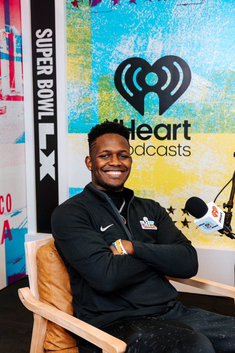 Clifford Taylor appearing at an iHeartRadio podcast during Super Bowl weekend represented by Raymond Representation.